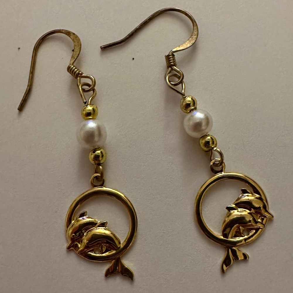 Gold dolphin earrings - from Bahamas